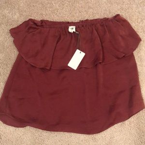 Flawless strapless ruffle top.